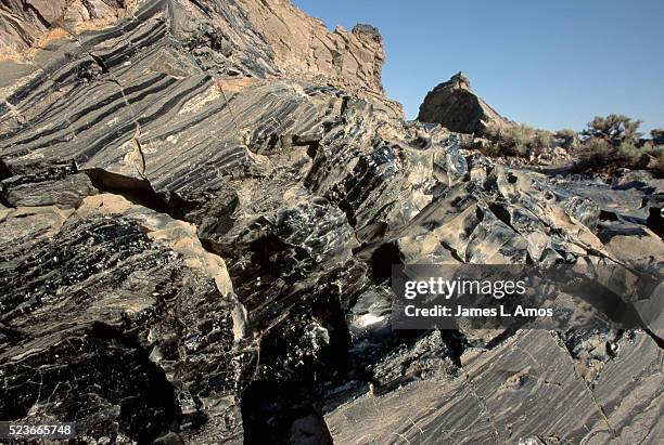 bands of obsidian volcanic glass - obsidian stock pictures, royalty-free photos & images