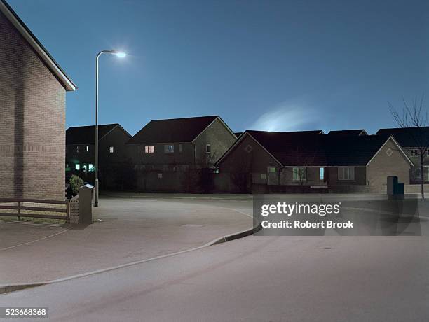 housing estate at night - citylight stockfoto's en -beelden