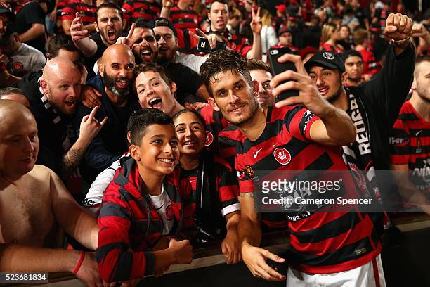 Dario Vidosic of the Wanderers poses with fans after winning the A-League Semi Final match in extra time between the Western Sydney Wanderers and the...