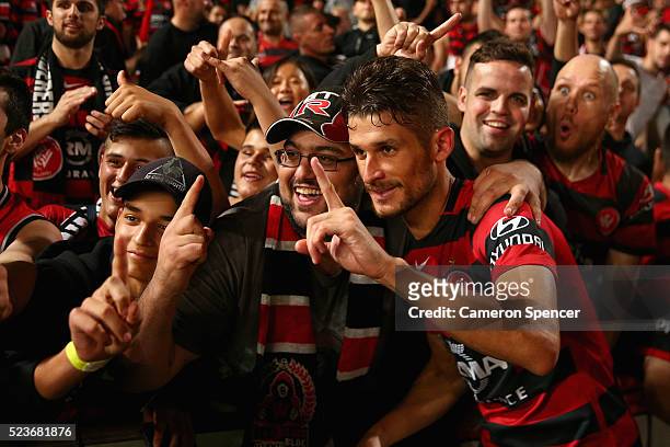 Dario Vidosic of the Wanderers poses with fans after winning the A-League Semi Final match in extra time between the Western Sydney Wanderers and the...