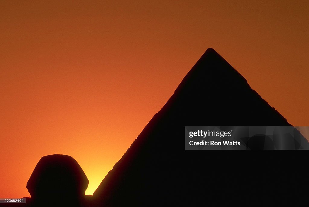 Detail of Great Sphinx at Giza and the Pyramid of Khafre in Silhouette