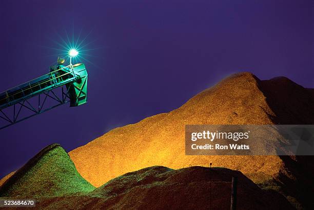 pile of wood chips at factory - paper industry stock pictures, royalty-free photos & images