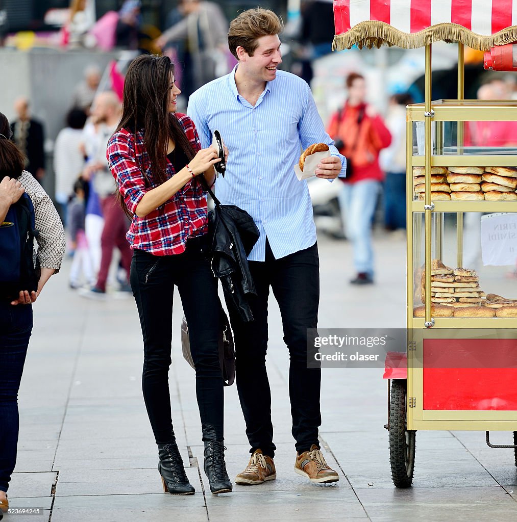 Couple at Galata bridge market / square