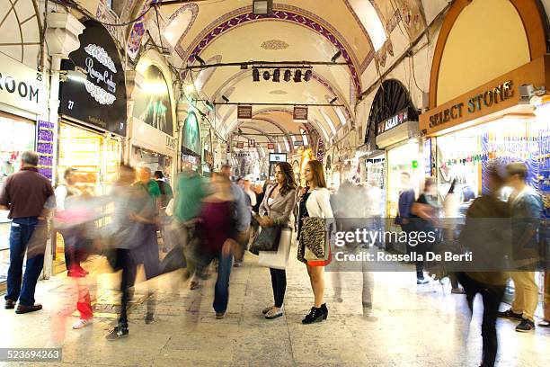 two woman going shopping at the grand bazaar. istanbul, turkey, - asian market stock pictures, royalty-free photos & images