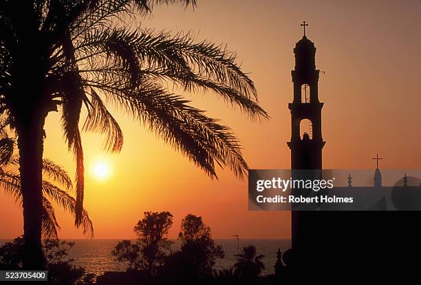 sunset over old jaffa - jaffa foto e immagini stock