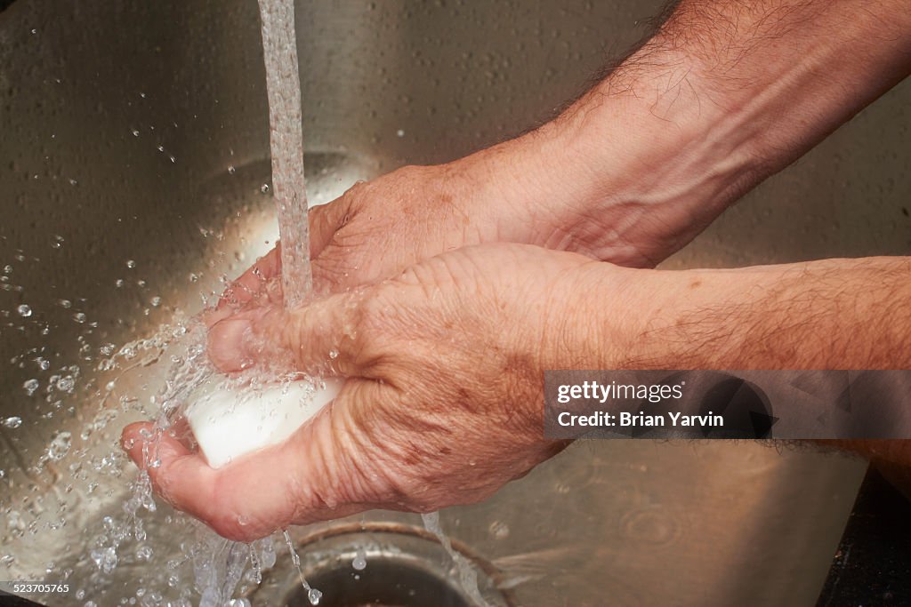 Man washing his hands