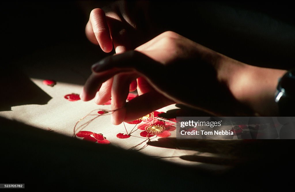 Close-up of Embroidering Flowers on Silk, China
