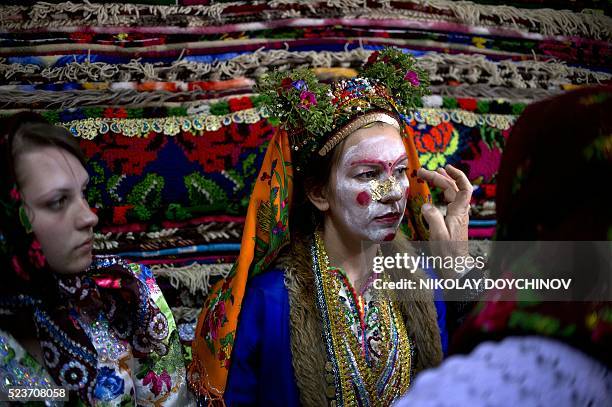 This picture taken on April 22 shows a Bulgarian Pomak bride Emilia Pechinkova, 24-years-old, as she goes through the "gelina" or face painting in...