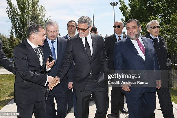 Actor George Clooney and 100 Lives Co-Founder Ruben Vardanyan attend the laying of the flowers at the Genocide Memorial in Yerevan, Armenia for the...