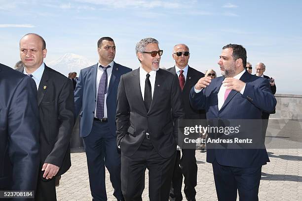 Actor George Clooney and 100 Lives Co-Founder Ruben Vardanyan attend the laying of the flowers at the Genocide Memorial in Yerevan, Armenia for the...