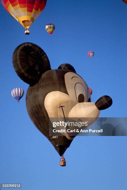 mickey mouse balloon - micky maus stock-fotos und bilder