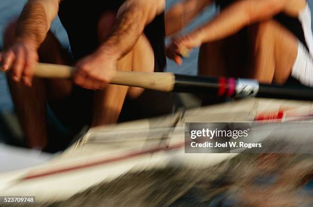 rowing team in a two man racing shell - rennrudern stock-fotos und bilder
