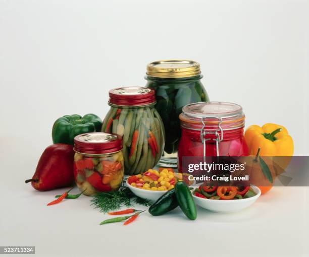 jars of home canned vegetables - pickled stock pictures, royalty-free photos & images