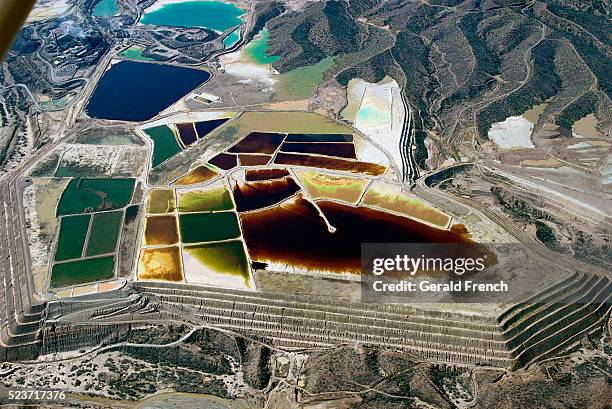 copper tailings ponds on a terraced hill - relave fotografías e imágenes de stock