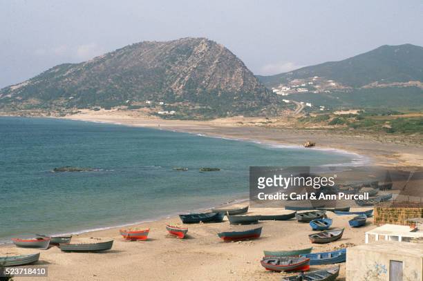 small boats on the beach - tangier stock pictures, royalty-free photos & images