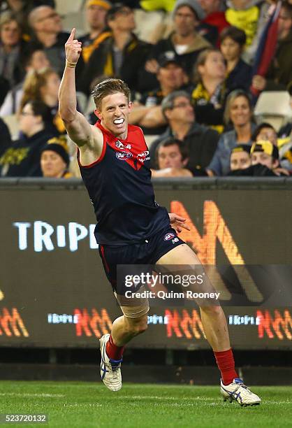 Sam Frost of the Demons celebrates after kicking a goal during the round five AFL match between the Melbourne Demons and the Richmond Tigers at...