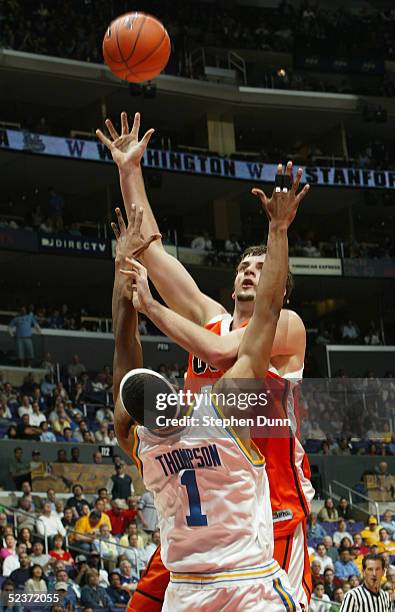 Nick Dewitz of the Oregon State Beavers puts up a shot over Dijon Thompson of the UCLA Bruins during the 2005 Pacific Life Pac-10 Men's Basketball...