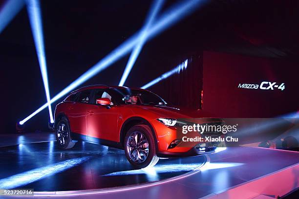 Mazda China introduces CX-4 during the Pre-Event For Beijing Motor Show - Auto China on April 24, 2016 in Beijing, China. Mazda China unveiled the...