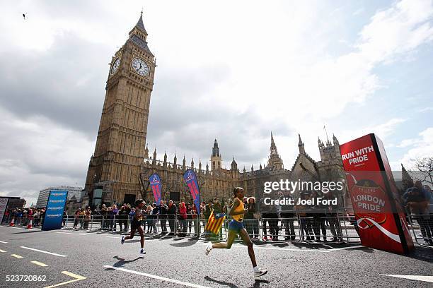 Jemima Sumgong of Kenya and Tigist Tufa of Ethiopia pass Big Ben during the 2016 Virgin Money London Marathon on April 24, 2016 in in London, England.