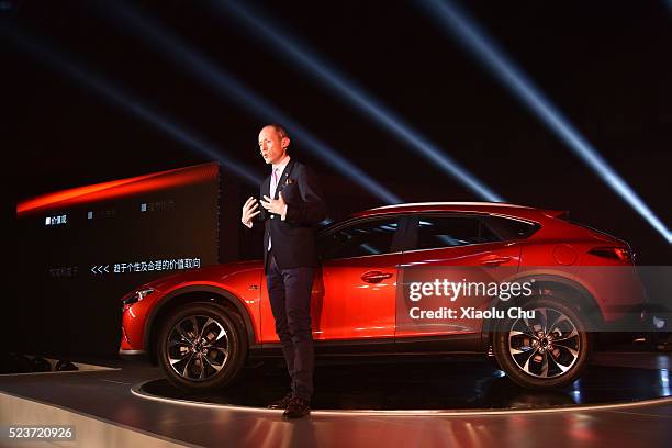 Naoki Okano, Program Manager for CX-4 of Mazda Motor Co speaks during the Pre-Event For Beijing Motor Show - Auto China on April 24, 2016 in Beijing,...