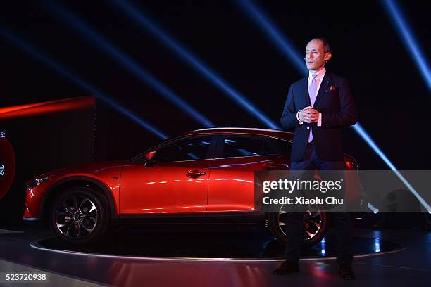 Naoki Okano, Program Manager for CX-4 of Mazda Motor Co speaks during the Pre-Event For Beijing Motor Show - Auto China on April 24, 2016 in Beijing,...