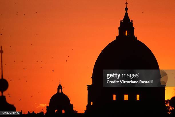 basilica domes at sunset - vatican city stockfoto's en -beelden