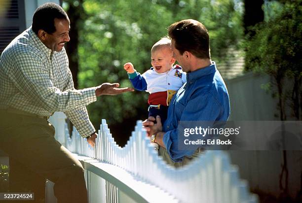 neighbors greeting each other - neighbour ストックフォトと画像