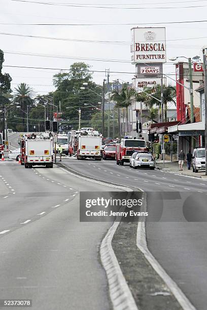 Firefighters battle a blaze at a Sydney furniture factory in Ashfield on March 11, 2005 in Sydney, Australia. The fire at the Brescia Furniture...
