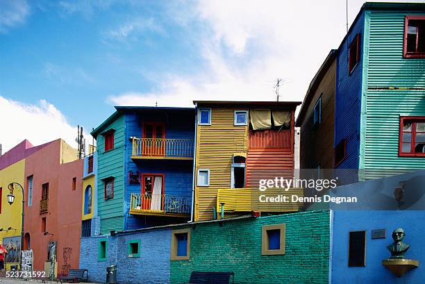 colorful apartments on caminito street - buenos aires photos et images de collection