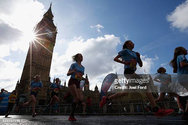Runners take part in the Virgin Money Giving Mini London Marathon at United Kingdom on April 24, 2016 in London, England.