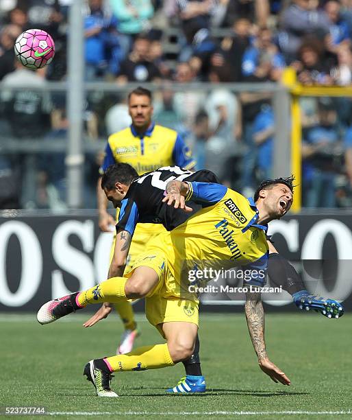 Lucas Nahuel Castro of AC Chievo Verona competes for the ball with Davide Brivio of Atalanta BC during the Serie A match between Atalanta BC and AC...