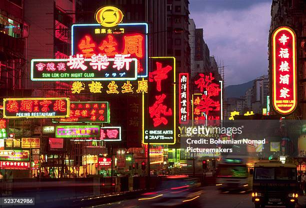 neon signs along nathan road in hong kong - nathan road bildbanksfoton och bilder