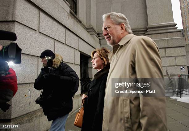 Bernard Ebbers former CEO of WorldCom enters Manhattan federal court with his wife Kristie on the 6th day of jury deliberations March 11 in New York...