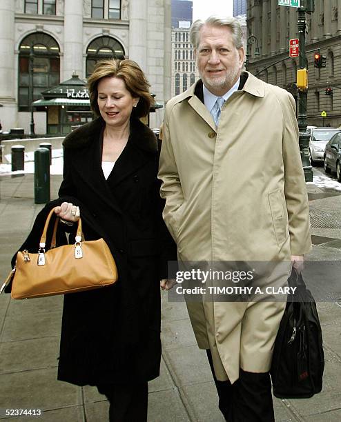 Bernard Ebbers , former CEO of WorldCom enters Manhattan federal court 11 March 2005 in New York with his wife Kristie on the 6th day of jury...