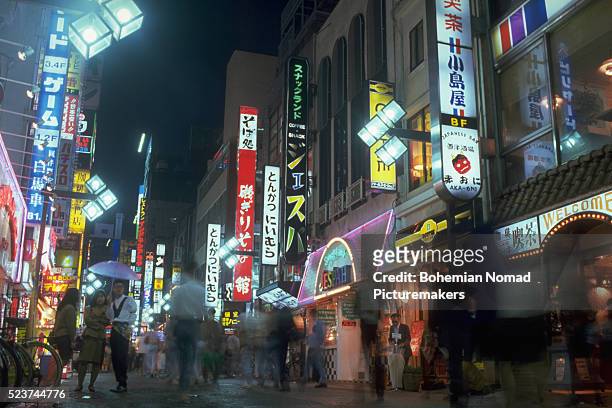 shinjuku district at night - 90's ストックフォトと画像