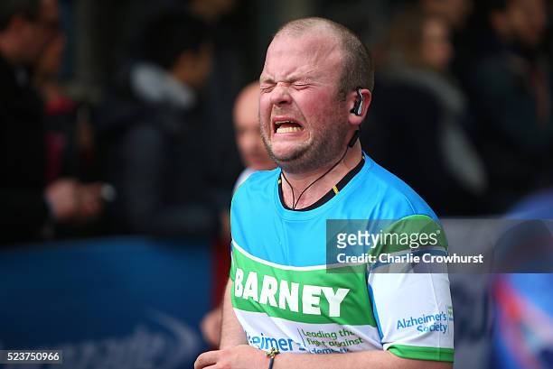 Participant pushes through the pain as they hit the wall at mile nineteen during the 2016 Virgin Money London Marathon on April 24, 2016 in London,...