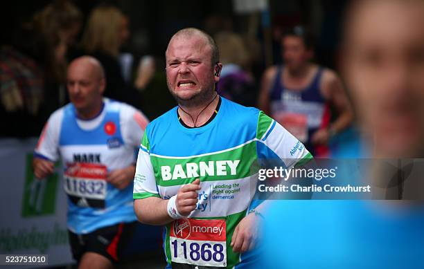 Participant pushes through the pain as they hit the wall at mile nineteen during the 2016 Virgin Money London Marathon on April 24, 2016 in London,...