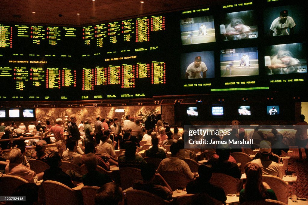 Sports Gamblers Betting at Casino Lounge