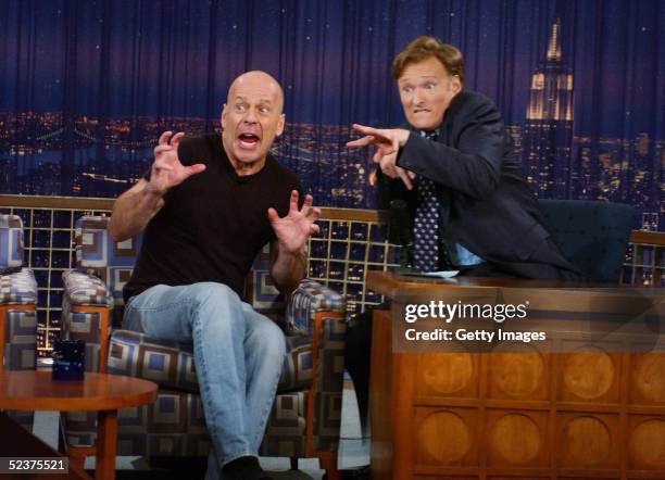 In this handout fron NBC, Actor Bruce Willis and Host Conan O'Brien appear on "Late Night with Conan O'Brien" March 10, 2005 in New York City.