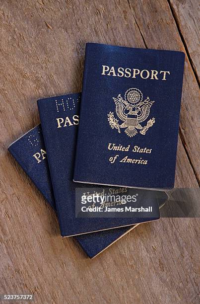 three u.s. passports - u s passport stock-fotos und bilder