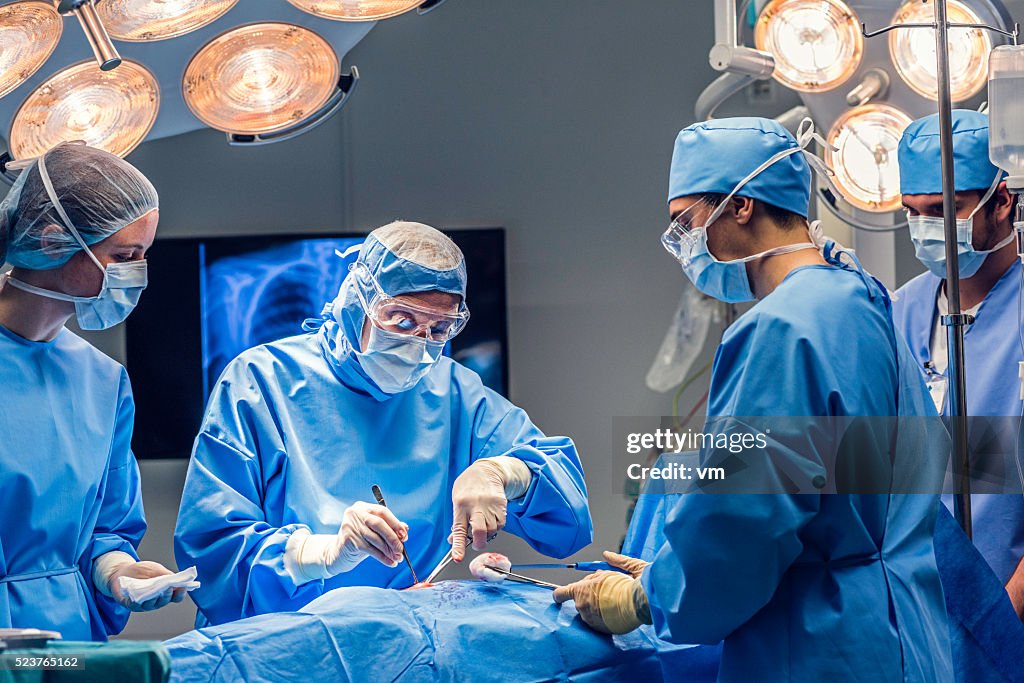 Doctors team in operating room