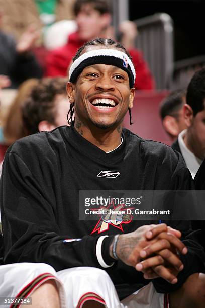 Allen Iverson of the Philadelphia 76ers smiles from the bench against the Charlotte Bobcats on March 11, 2005 at the Wachovia Center in Philadelphia,...