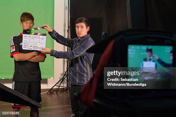 Heung-Min Son of Bayer Leverkusen is staning behind the Clapperboard during media day at the Tauern Spa on July 14, 2013 in Zell am See, Austria.