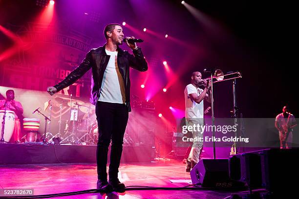 Nick Jonas and Troy Andrews of Trombone Shorty & Orleans Avenue perform at Saenger Theatre on April 23, 2016 in New Orleans, Louisiana.