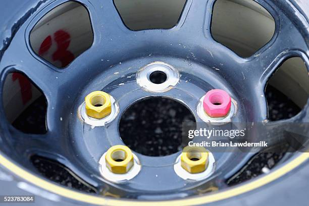 Detailed view of lug nuts glued to a tire in the garage area prior to the NASCAR Sprint Cup Series TOYOTA OWNERS 400 at Richmond International...