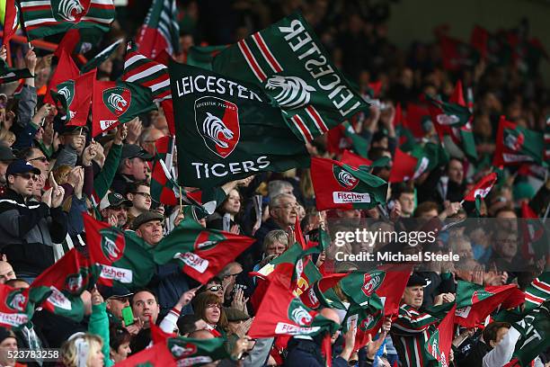 Supporters of Leicester fly the flags during the European Rugby Champions Cup Semi-Final match between Leicester Tigers and Racing 92 at the City...