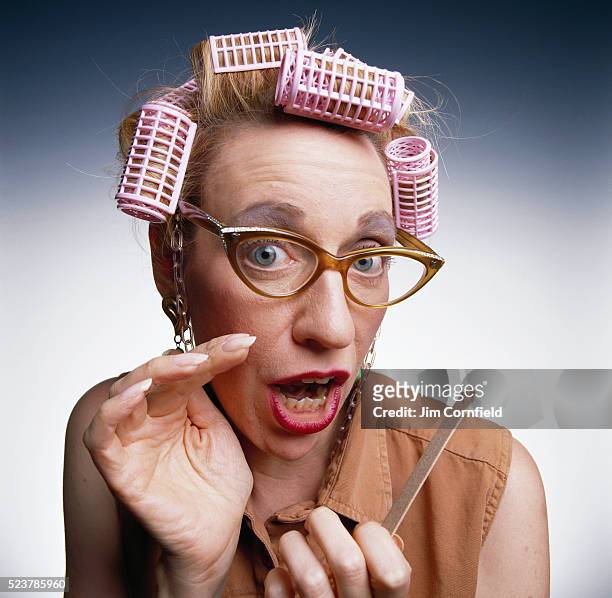 gossiping woman wearing curlers - gossip stock pictures, royalty-free photos & images