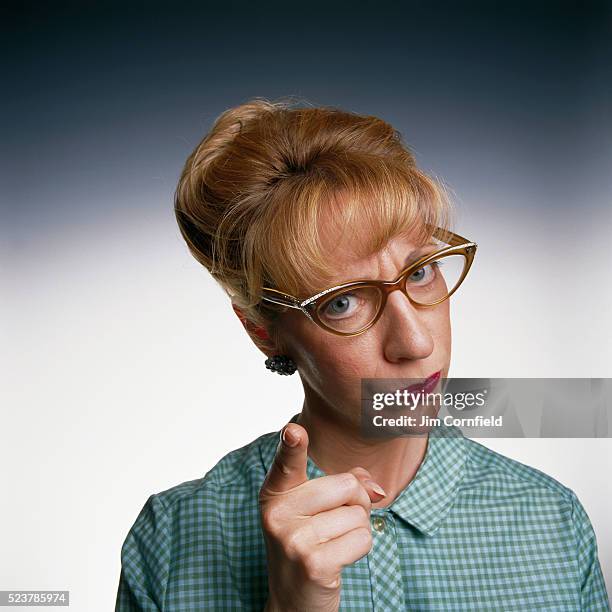 woman pointing her finger - ammonite foto e immagini stock