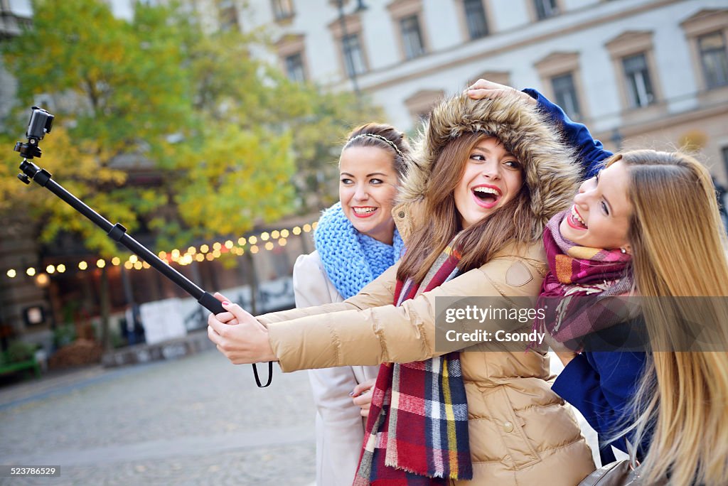 Young friends together making selfie