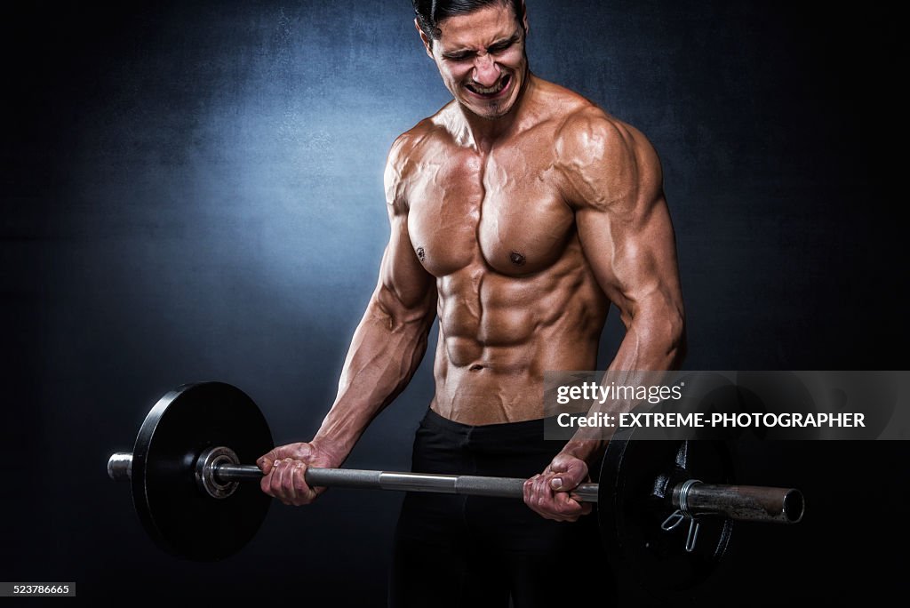 Man exercising with barbell